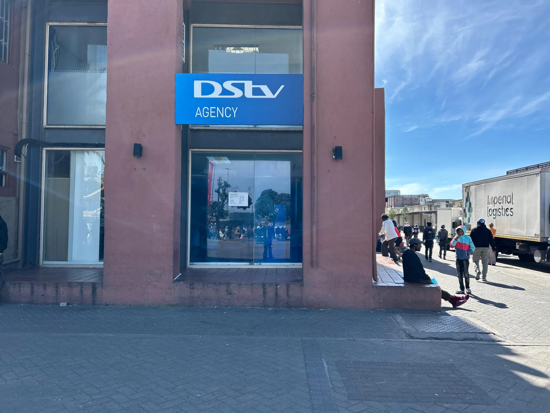 DStv Agency sign on RA Digital shopfront